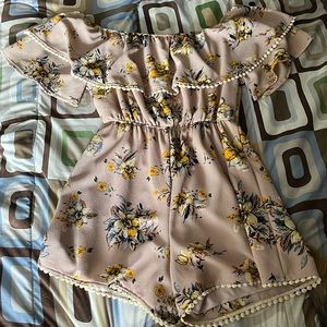 This is a pinkish-purplish romper. worn once